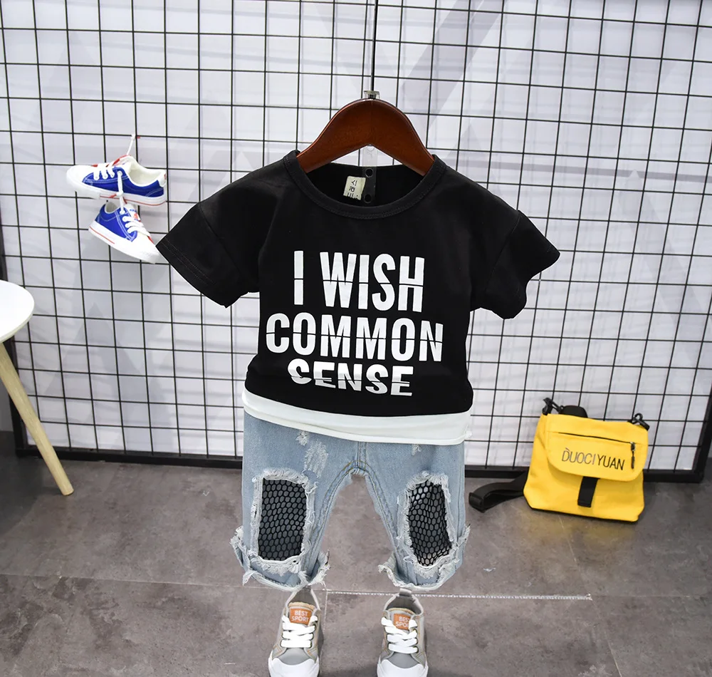Fashion O-Neck Black Letter T-Shirt Hold Jeans Pants Shorts Summer Baby Boys Girls Clothes Set Toddler Kids Korean Clothing
Fashion O-Neck Black Letter T-Shirt Hold Jeans Pants Shorts Summer Baby Boys Girls Clothes Set Toddler Kids Korean Clothing