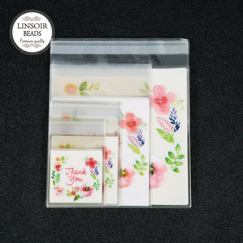 100Pcs Cute Flower Bags Plastic Biscuit Bags Wedding Candy/Jewelry Packing Self Adhesive Bags OPP Bag High Quality
100Pcs Cute Flower Bags Plastic Biscuit Bags Wedding Candy/Jewelry Packing Self Adhesive Bags OPP Bag High Quality