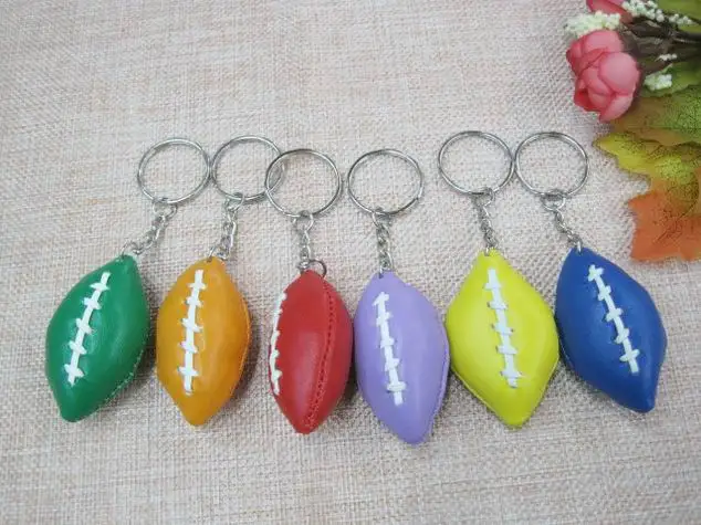 Rugby football bag plastic Pendant Rugby ball advertisement keychain small sport key chain fans souvenirs key ring
Rugby football bag plastic Pendant Rugby ball advertisement keychain small sport key chain fans souvenirs key ring