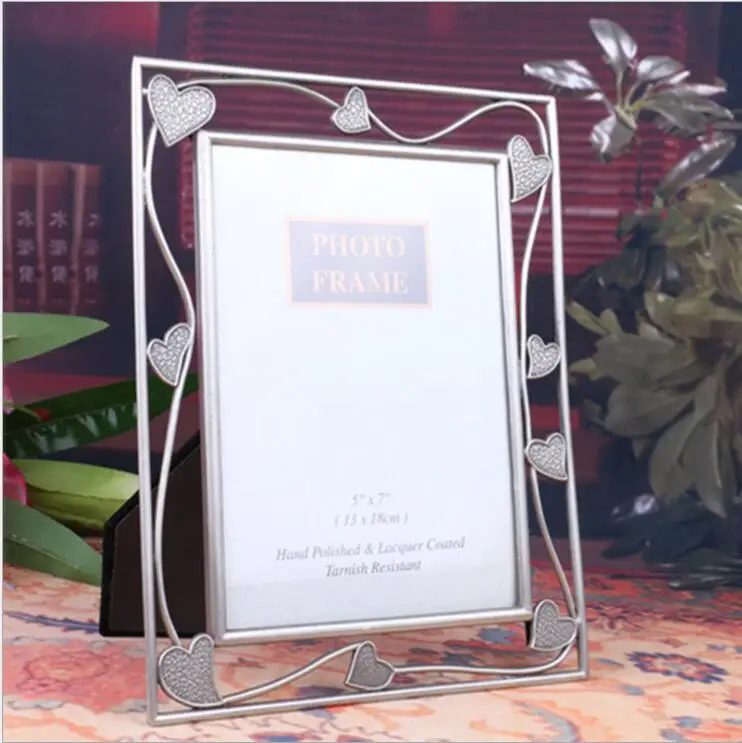Europe 6inch/7inch metal photo frame picture frame poster frame for home decoration baby frame XC065
Europe 6inch/7inch metal photo frame picture frame poster frame for home decoration baby frame XC065