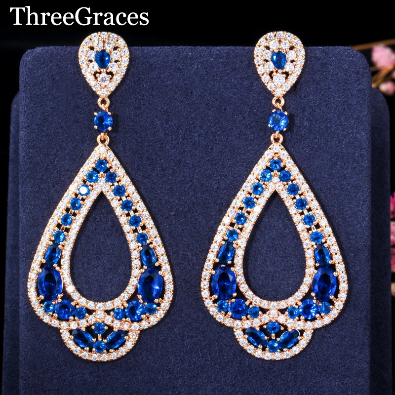 ThreeGraces Роскошные африканские вечерние ювелирные изделия золотого цвета CZ камень микро проложить большие темно-синие Висячие серьги для жен...
ThreeGraces Роскошные африканские вечерние ювелирные изделия золотого цвета CZ камень микро проложить большие темно-синие Висячие серьги для жен...