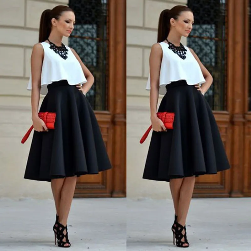 New Fashion Women 2PCs Clothes Sets Sexy Sleeveless Crop Top and High Waist Solid Pleated Skirts Summer Sets for Women
New Fashion Women 2PCs Clothes Sets Sexy Sleeveless Crop Top and High Waist Solid Pleated Skirts Summer Sets for Women