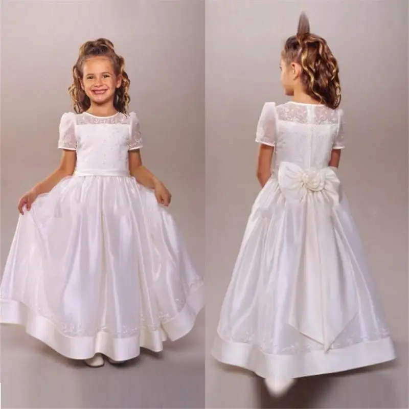 White Short Sleeve Flower Girls Dress With Bow Knot New 2021 A Line Ankle Length Satin First Communion Dresses for Girls
White Short Sleeve Flower Girls Dress With Bow Knot New 2021 A Line Ankle Length Satin First Communion Dresses for Girls