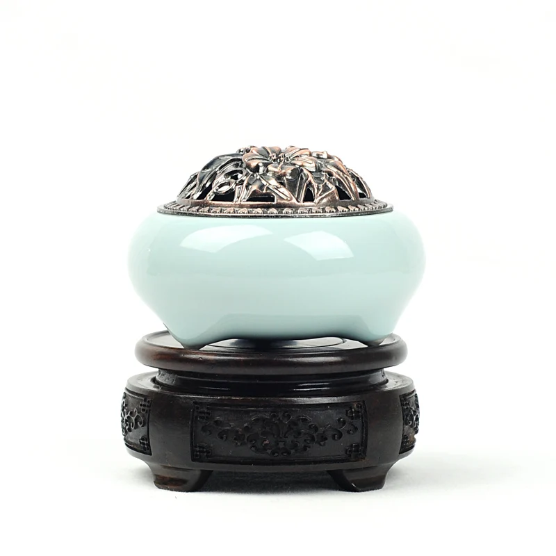 Width of Longquan celadon incense burner ceramic small fragrant oil burner incense coil furnaces imitates the copper furnace
Width of Longquan celadon incense burner ceramic small fragrant oil burner incense coil furnaces imitates the copper furnace
