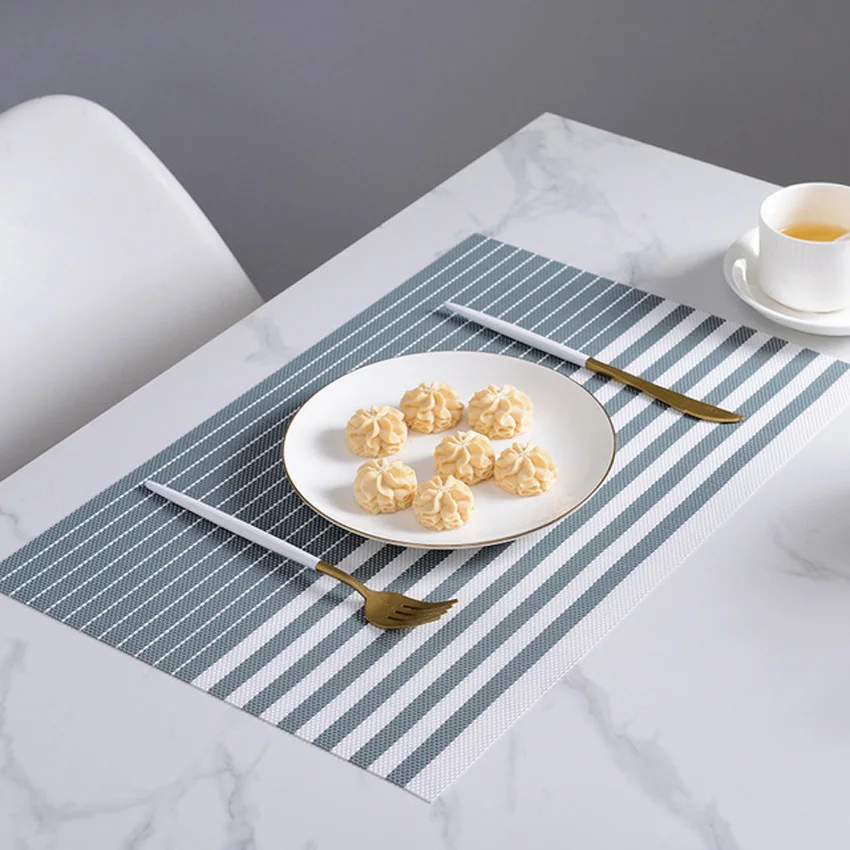 4Pcs/Lot Stripe PVC Placemats Heat Resistant Non Slip Dining Table Mats Mug Coasters 45X30cm Kitchen Decoration Accessories
4Pcs/Lot Stripe PVC Placemats Heat Resistant Non Slip Dining Table Mats Mug Coasters 45X30cm Kitchen Decoration Accessories