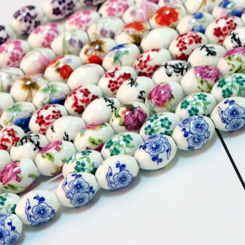 New KoMee Oval Shape Creamic Beads 11x15mm 50pcs/lot White With Various Flower Pattern Bead For Decoration Handmade DIY Material
New KoMee Oval Shape Creamic Beads 11x15mm 50pcs/lot White With Various Flower Pattern Bead For Decoration Handmade DIY Material