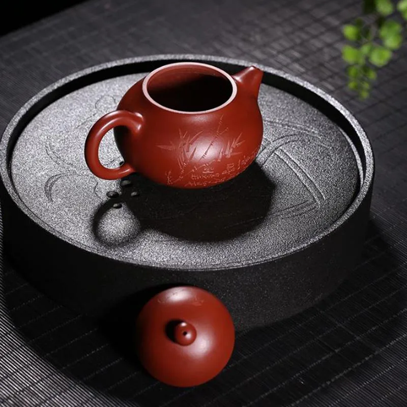 220ml Authentic Yixing Purple Clay Pot Engraving Bamboo Pattern Dahongpao Mud Zisha Teapot Household Drinkware Decoration Crafts
220ml Authentic Yixing Purple Clay Pot Engraving Bamboo Pattern Dahongpao Mud Zisha Teapot Household Drinkware Decoration Crafts