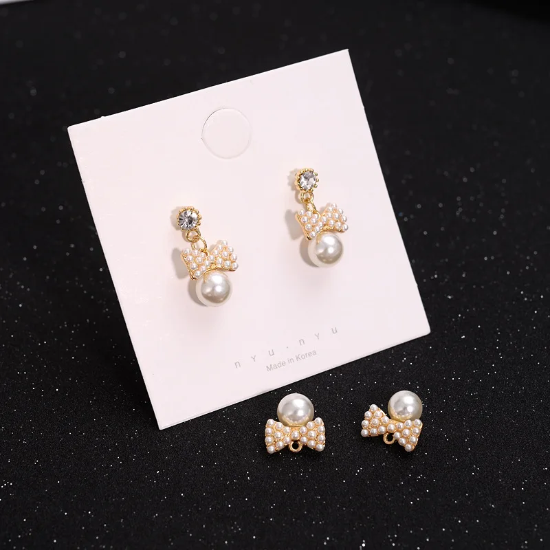 50pcs High quality Gold Color Alloy Material Imitation Pearl Bow shape Heart shape Charm For Earring DIY Handmade Jewelry Making
50pcs High quality Gold Color Alloy Material Imitation Pearl Bow shape Heart shape Charm For Earring DIY Handmade Jewelry Making