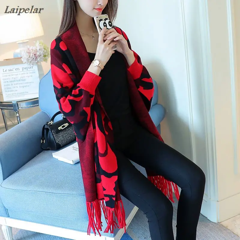 Cape shawl knitted cardigan female new winter fashion bat sleeve loose camouflage coat In the fall of new clothes
Cape shawl knitted cardigan female new winter fashion bat sleeve loose camouflage coat In the fall of new clothes