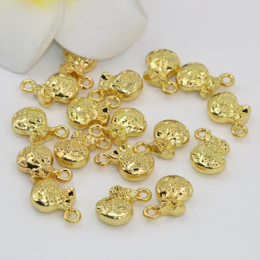 Exquisite diy findings fashion 5pcs gold-color money bag shape 10*11mm spacers beads little pendant accessories findings B2557
Exquisite diy findings fashion 5pcs gold-color money bag shape 10*11mm spacers beads little pendant accessories findings B2557