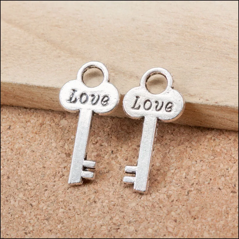 Factory price 10 Pieces/Lot 26mm*13mm Antique Silver plated love key charm diy handmade craft For Jewelry Making
Factory price 10 Pieces/Lot 26mm*13mm Antique Silver plated love key charm diy handmade craft For Jewelry Making
