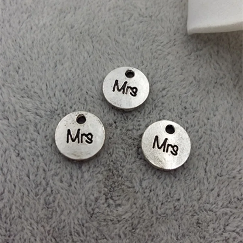 Top Quality 50 Pieces/lot Diameter 10mm Antique Silver Plated Letter Printed Mrs Girl Charm 10MM Tag For Jewelry Making Charms
Top Quality 50 Pieces/lot Diameter 10mm Antique Silver Plated Letter Printed Mrs Girl Charm 10MM Tag For Jewelry Making Charms