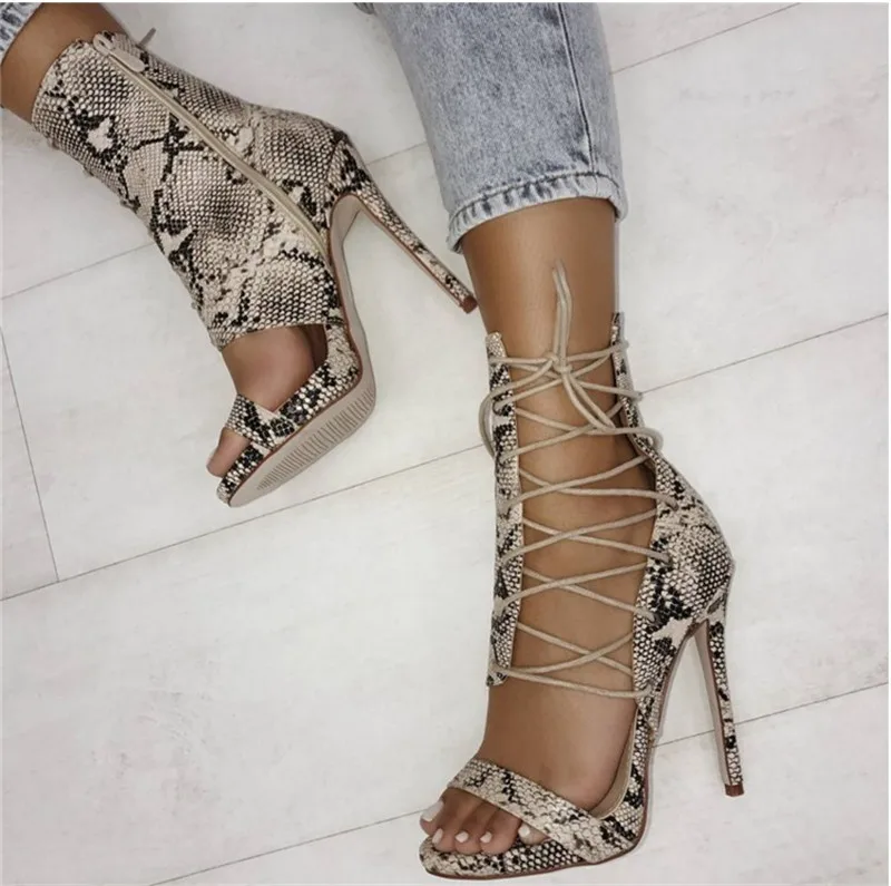 Sestito New Fashion 2018 Female Sexy Snakeskin Print Thin High Heels Gladiator Sandals Boots Ladies Cut-outs Lace-up Ankle Boots
Sestito New Fashion 2018 Female Sexy Snakeskin Print Thin High Heels Gladiator Sandals Boots Ladies Cut-outs Lace-up Ankle Boots