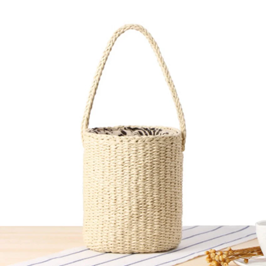 Ethnic wind hand carry bucket straw bag handmade paper rope woven beach bag simple leisure beach bag
Ethnic wind hand carry bucket straw bag handmade paper rope woven beach bag simple leisure beach bag