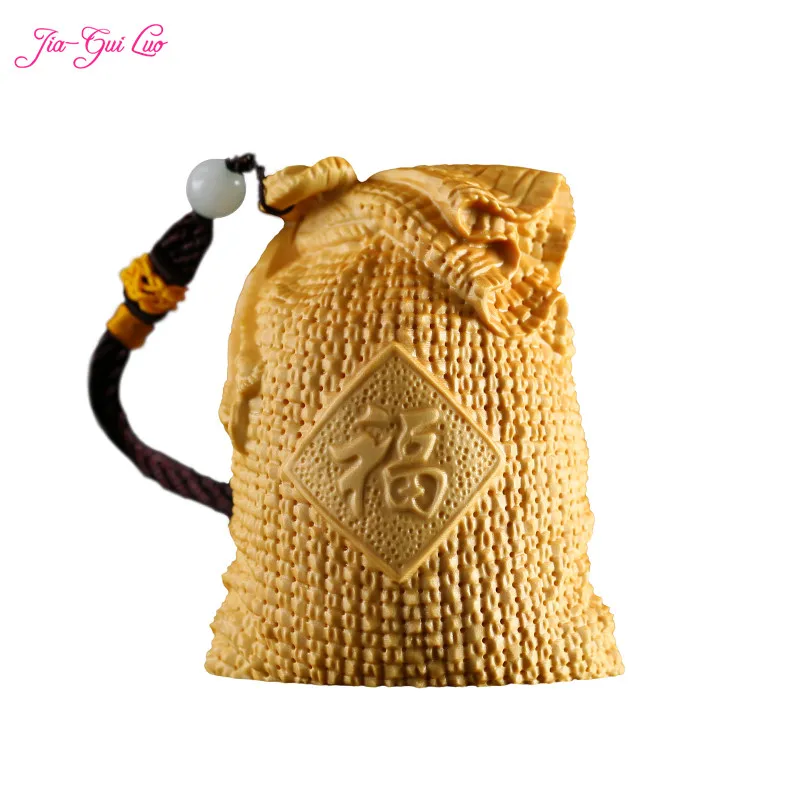 JIA-GUI LUO Boxwood carving creative car pendants carving handicrafts lucky to play hand pieces to the welfare bag purse A040
JIA-GUI LUO Boxwood carving creative car pendants carving handicrafts lucky to play hand pieces to the welfare bag purse A040