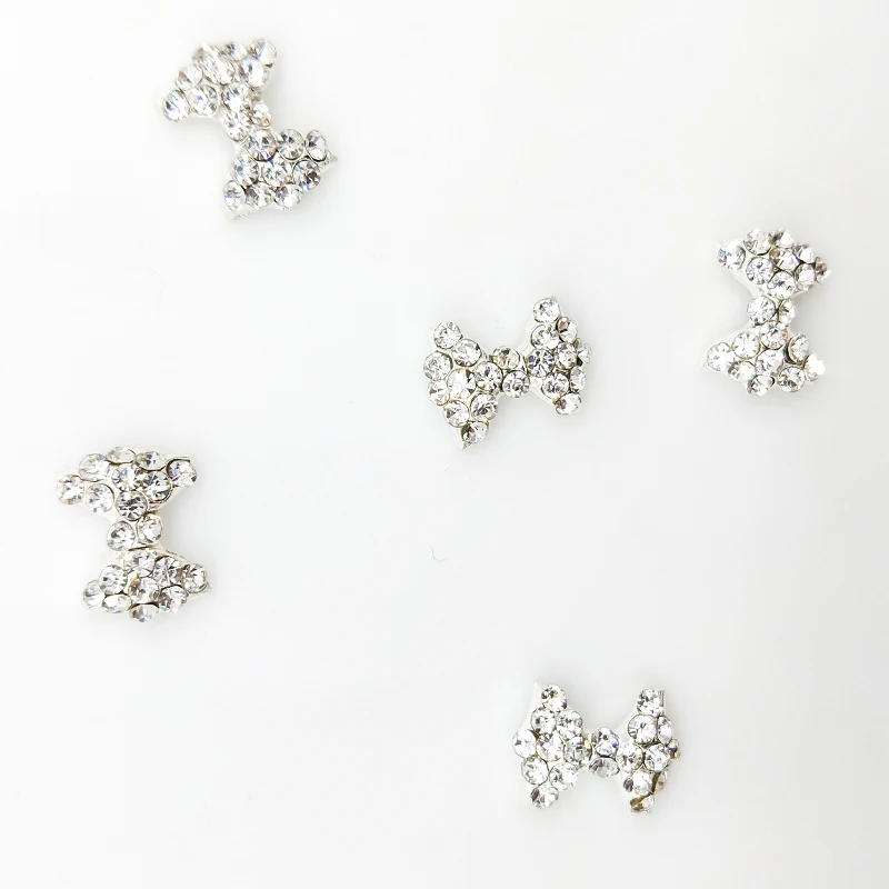 LEAMX 10 PCS/bag 3D Bow Nail Art Rhinestone Decoration Alloy Nails Charms Sparkling Crystal Bow Tie For Nails Dekor DIY L355
LEAMX 10 PCS/bag 3D Bow Nail Art Rhinestone Decoration Alloy Nails Charms Sparkling Crystal Bow Tie For Nails Dekor DIY L355