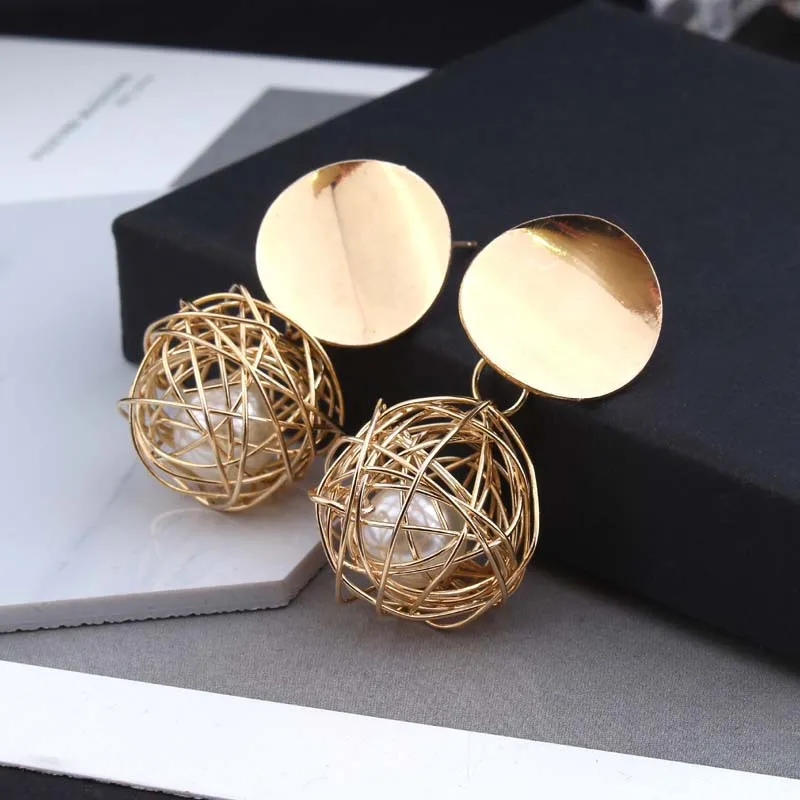 Geometric Hollowed Alloy Ball Simulated Pearl Drop Earrings For Women Round Circle Charm Bold Statement Earrings For Women
Geometric Hollowed Alloy Ball Simulated Pearl Drop Earrings For Women Round Circle Charm Bold Statement Earrings For Women