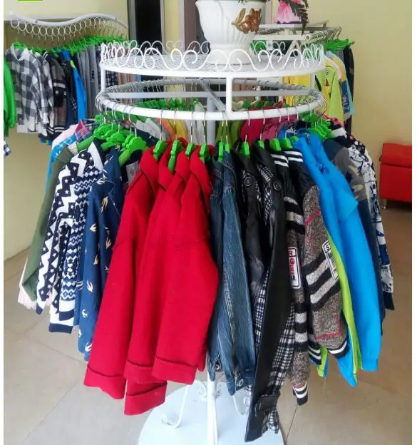 

High - end children's clothing store shelves clothing rack wrought iron circular rotating hangers display shelf island shelf flo