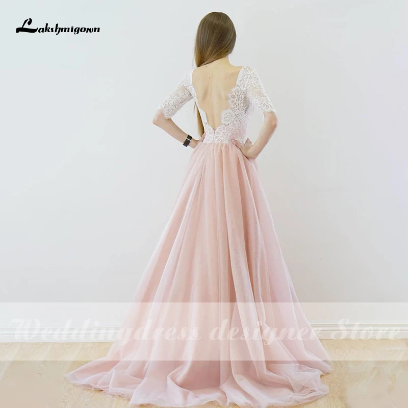 Lakshmigown Pink Tulle A Line Wedding Dresses 2021 V Neck Backless Half Sleeves Lace Top Bridal Gowns robe de mariee
Lakshmigown Pink Tulle A Line Wedding Dresses 2021 V Neck Backless Half Sleeves Lace Top Bridal Gowns robe de mariee
