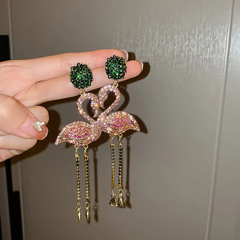 925 silver needle European and American rhinestone long earrings elegant swan creative design earrings women tassel earrings
925 silver needle European and American rhinestone long earrings elegant swan creative design earrings women tassel earrings