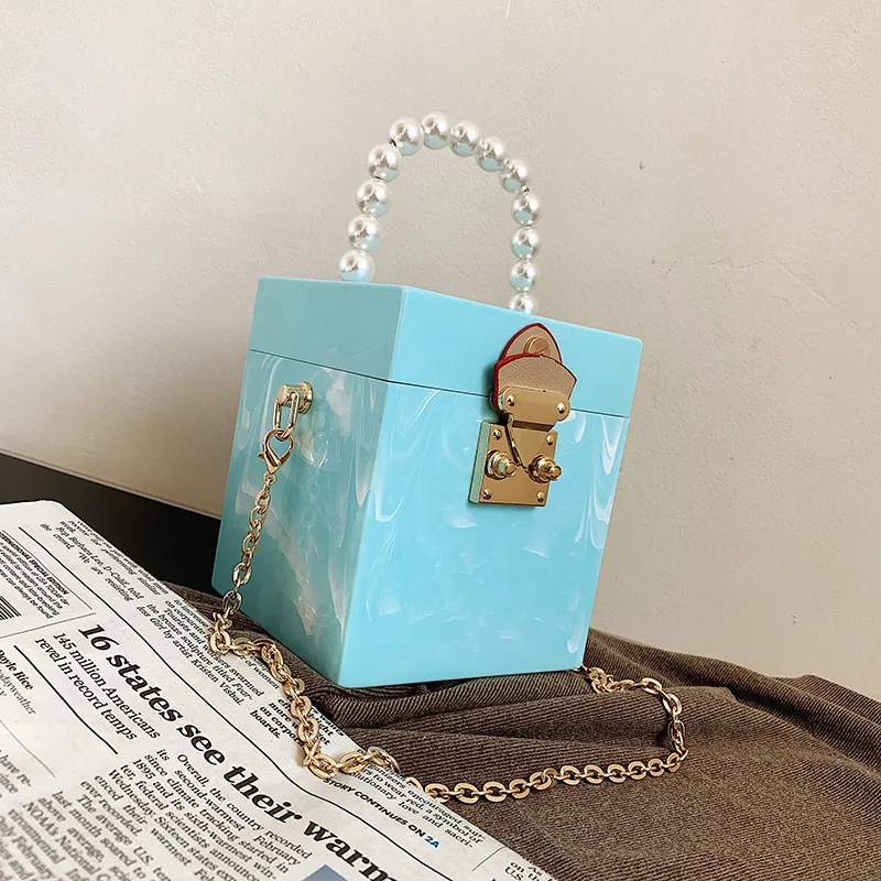 Trend Acrylic Box Handbag With Pearl Portable Chian For Women Elegant Evening Party Shoulder Bag Totes Female Cosmetic Bags
Trend Acrylic Box Handbag With Pearl Portable Chian For Women Elegant Evening Party Shoulder Bag Totes Female Cosmetic Bags