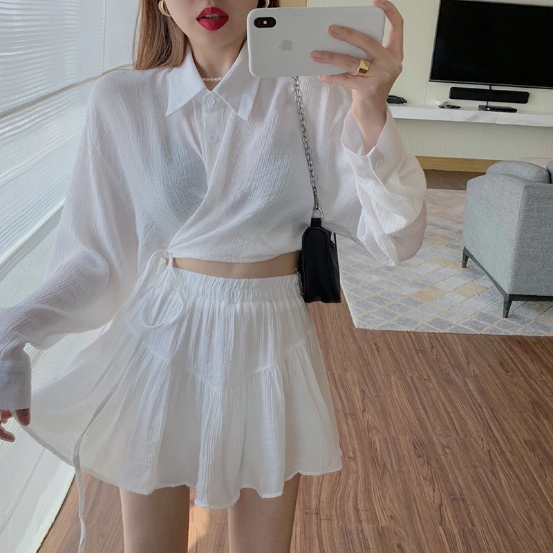Lace-up Turn Down Collar Thin Shirt + Age-reducing Solid Color Pleated A-line Skirt Ensembles Femme 2021 Summer Two Piece Sets
Lace-up Turn Down Collar Thin Shirt + Age-reducing Solid Color Pleated A-line Skirt Ensembles Femme 2021 Summer Two Piece Sets