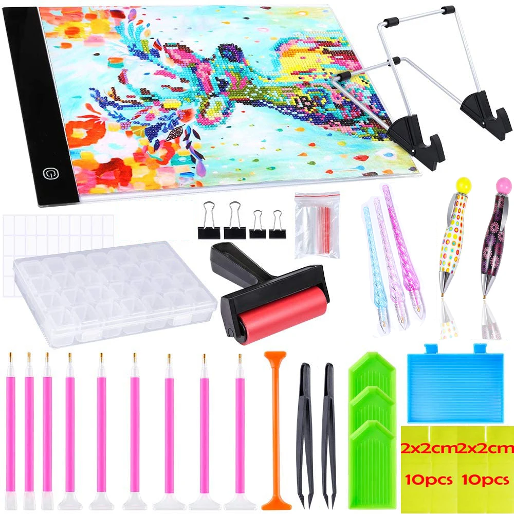 Diamond Painting Cross Stitch Tool Set A4 LED Light Pad, Pen, Tweezers, Clay, Tray, Roller and Diamond Embroidery Box Accessorie
Diamond Painting Cross Stitch Tool Set A4 LED Light Pad, Pen, Tweezers, Clay, Tray, Roller and Diamond Embroidery Box Accessorie