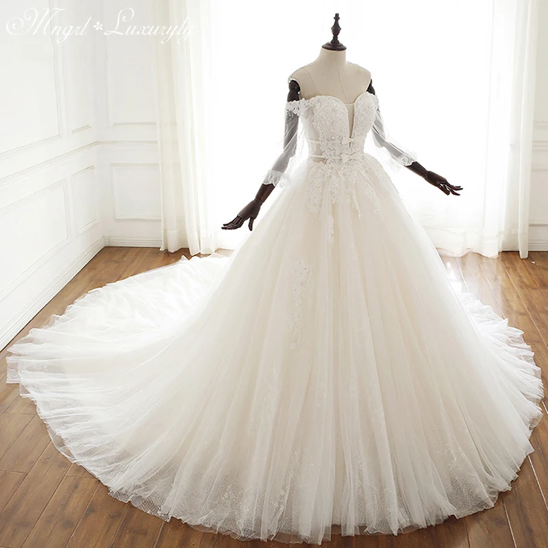Luxury Wedding Dresses Long Sleeve Tube Top Lace Applique Handmade Beading Gowns Bow Double Belt Royal Train vestidos de novia
Luxury Wedding Dresses Long Sleeve Tube Top Lace Applique Handmade Beading Gowns Bow Double Belt Royal Train vestidos de novia