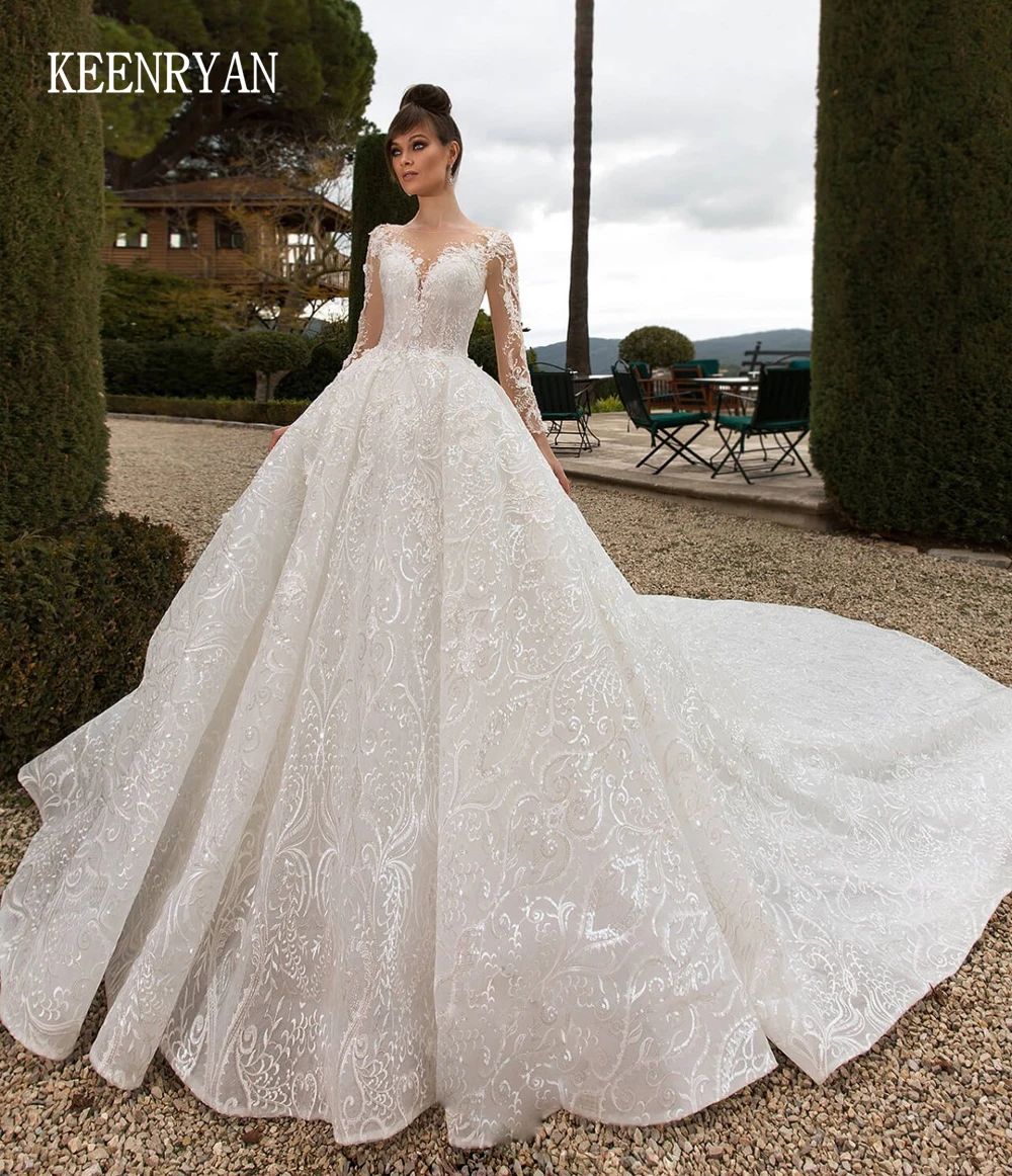 KEENRYAN Appliques A-Line Wedding Dress 2020 Beaded Boat Neck Long Sleeve Court Train Crystal Bridal Gown Vestido de Noiva
KEENRYAN Appliques A-Line Wedding Dress 2020 Beaded Boat Neck Long Sleeve Court Train Crystal Bridal Gown Vestido de Noiva