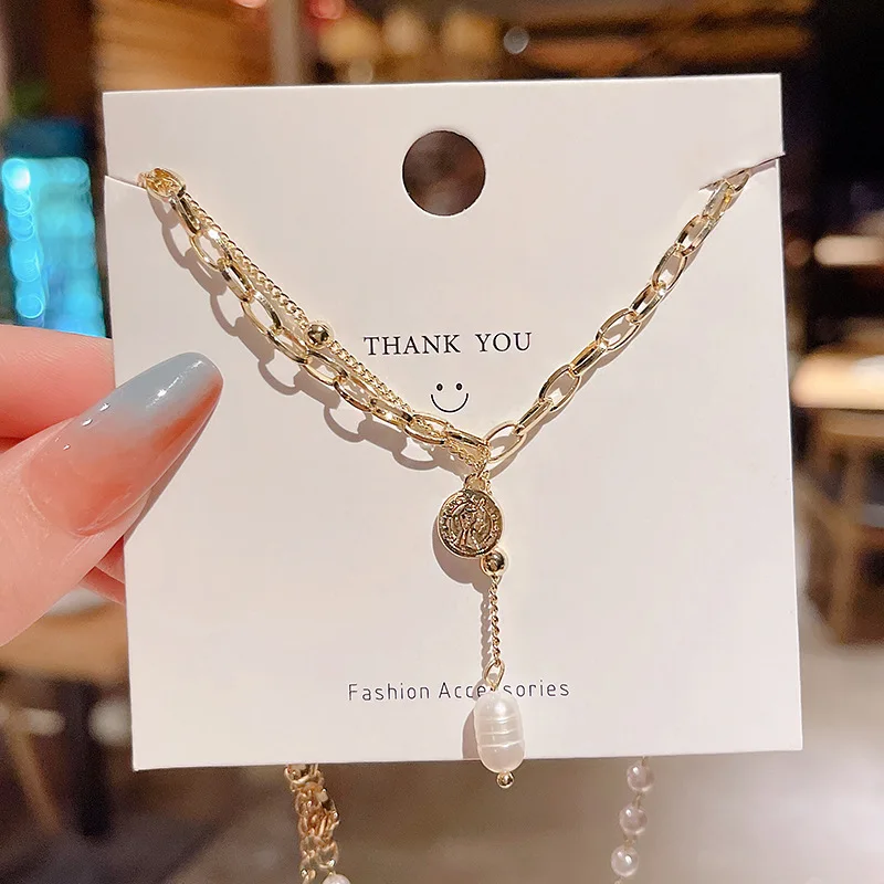 New fashion personality baroque pearl double tassel necklace female temperament all-match clavicle chain
New fashion personality baroque pearl double tassel necklace female temperament all-match clavicle chain