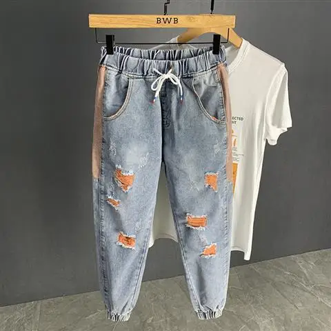 2021 leisure Harlem holed bunched jeans trend men's autumn loose thin fashion brand small leg Capris 
2021 leisure Harlem holed bunched jeans trend men's autumn loose thin fashion brand small leg Capris