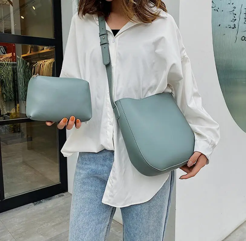 Pure color Casual Bucket bag 2021 New High quality PU Leather Women's Designer Handbag High capacity Shoulder Messenger Bag
Pure color Casual Bucket bag 2021 New High quality PU Leather Women's Designer Handbag High capacity Shoulder Messenger Bag