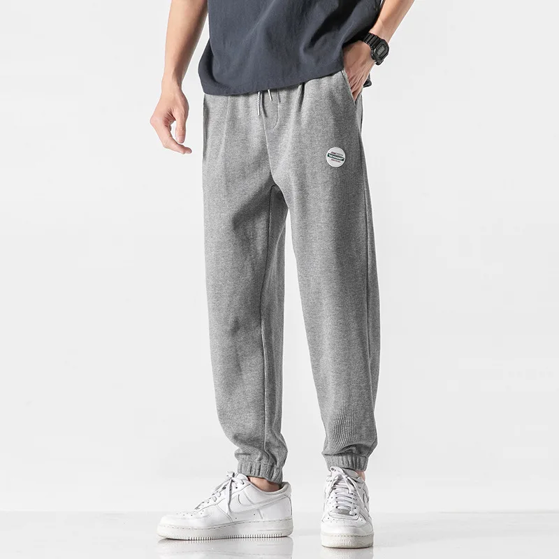Lktm men's # summer fashion brand sports grey waffle pants men's loose legged thin casual pants
Lktm men's # summer fashion brand sports grey waffle pants men's loose legged thin casual pants