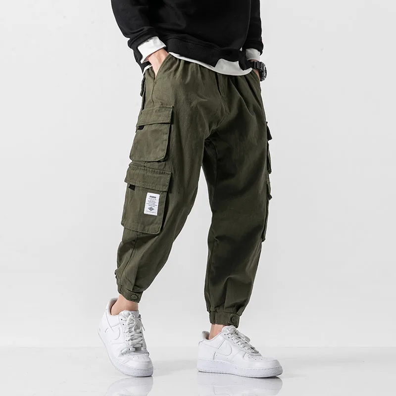 2021Streetwear Men's Multi Pockets Cargo Harem Pants Hip Hop Casual Male Track Pants Joggers Trousers Cotton Harajuku Men Pants
2021Streetwear Men's Multi Pockets Cargo Harem Pants Hip Hop Casual Male Track Pants Joggers Trousers Cotton Harajuku Men Pants