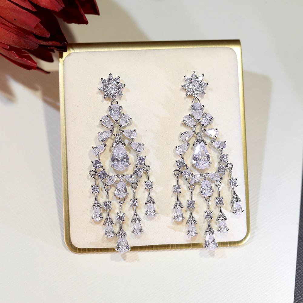 ASNORA Luxury Cubic Zirconia Tassel Water Drop Pendant Long CZ Crystal Drop Earrings Women Fashion Party Jewelry
ASNORA Luxury Cubic Zirconia Tassel Water Drop Pendant Long CZ Crystal Drop Earrings Women Fashion Party Jewelry