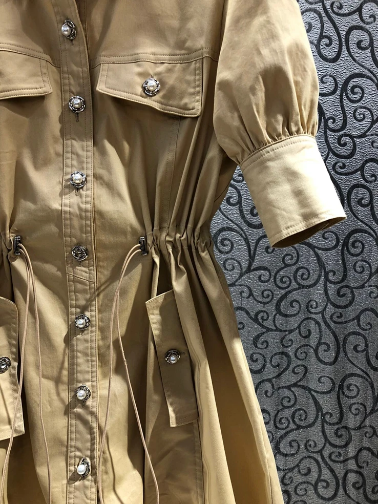 European Style Women Dress 2021 Summer Street Lapel Pocket Single-Breasted Drawstring Waist Dress Fashion Simple Mini Dress 
European Style Women Dress 2021 Summer Street Lapel Pocket Single-Breasted Drawstring Waist Dress Fashion Simple Mini Dress