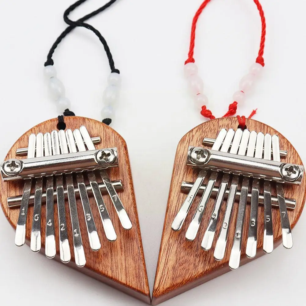 Eight-tone Mini Kalimba Finger Portable Piano Wood DIY Christmas Base Heart Piano Half Pendant Assembly Thumb Q2L1
Eight-tone Mini Kalimba Finger Portable Piano Wood DIY Christmas Base Heart Piano Half Pendant Assembly Thumb Q2L1