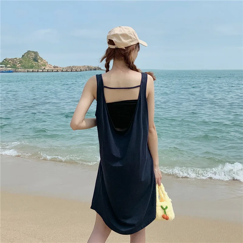 Summer New Women's Summer Sleeveless Strap Sexy Backless Girl's Loose Leisure Tops Vest Beach Skirt 
Summer New Women's Summer Sleeveless Strap Sexy Backless Girl's Loose Leisure Tops Vest Beach Skirt