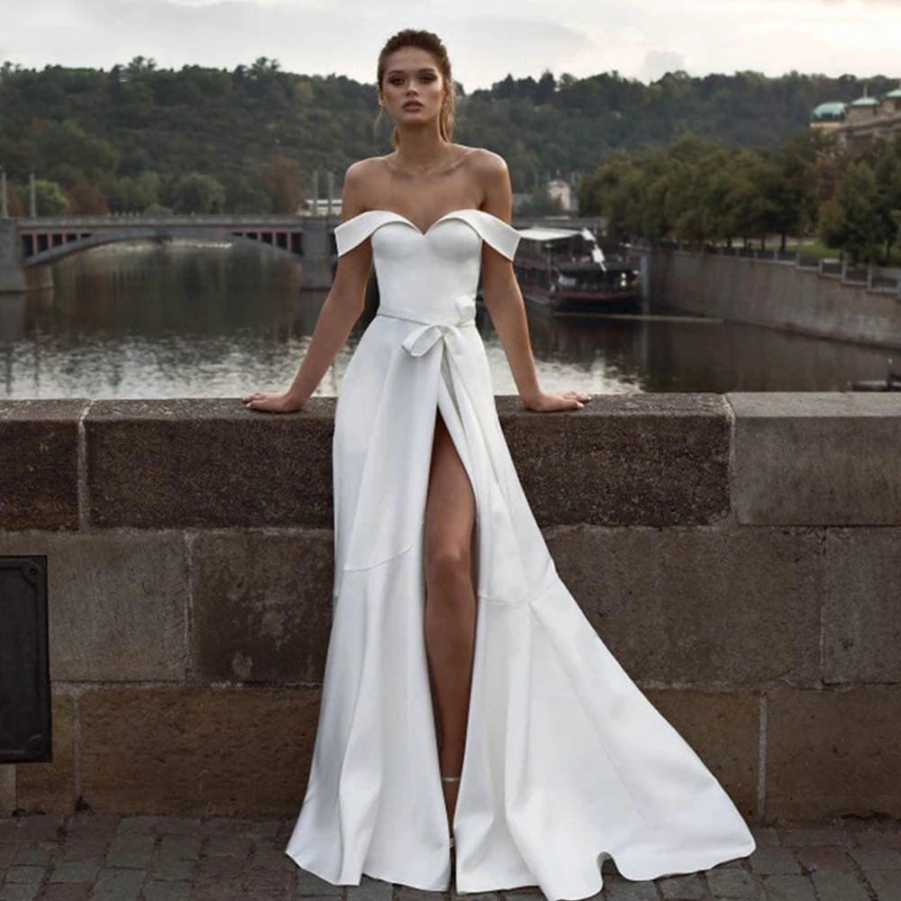 Женское свадебное платье с открытыми плечами, белое платье-Русалка с разрезом сбоку, поясом и карманами, платье невесты, 2021 
Женское свадебное платье с открытыми плечами, белое платье-Русалка с разрезом сбоку, поясом и карманами, платье невесты, 2021