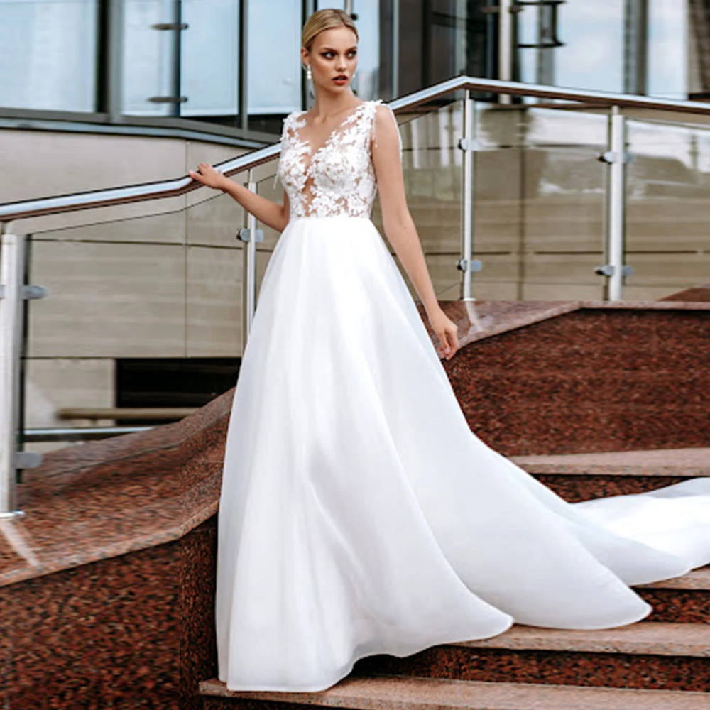 2021 Organza Wedding Dress Beads Lace Wedding Dresses Simple Button Illusion Back Beach Bridal Gowns
2021 Organza Wedding Dress Beads Lace Wedding Dresses Simple Button Illusion Back Beach Bridal Gowns