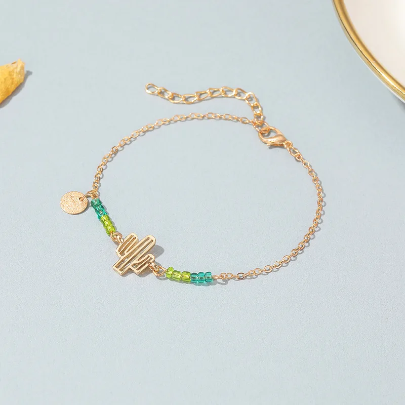 Origin Summer Cute Colorful Beads Cactus Charm Bracelets for Women Gold Color Chain Coin Green Plant Bracelet Statement Jewelry
Origin Summer Cute Colorful Beads Cactus Charm Bracelets for Women Gold Color Chain Coin Green Plant Bracelet Statement Jewelry
