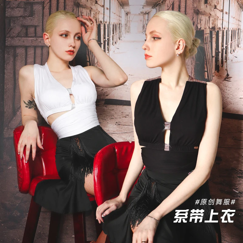 Women Latin Dance Costumes Latin Blouse Summer Backless Strap Short Blouse V-Neck Hollow Dance Latin Practice Clothes DN8457
Women Latin Dance Costumes Latin Blouse Summer Backless Strap Short Blouse V-Neck Hollow Dance Latin Practice Clothes DN8457