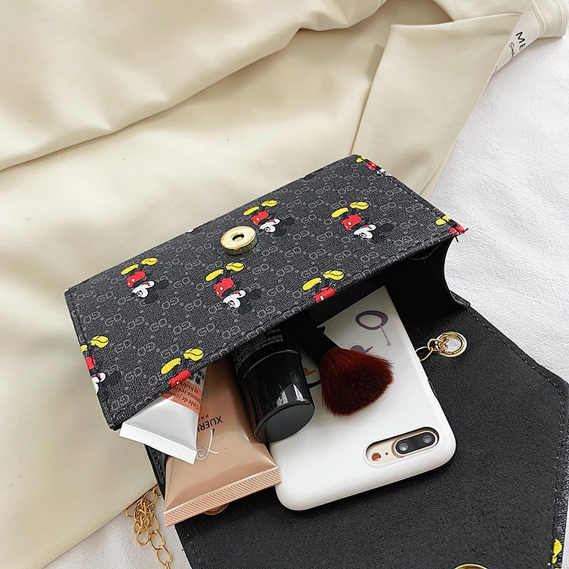 Women's New PU Casual Fashion Cute Cartoon Print Mickey Shoulder Tote Bags Leather Material Hasp Top-Handle Handbags 
Women's New PU Casual Fashion Cute Cartoon Print Mickey Shoulder Tote Bags Leather Material Hasp Top-Handle Handbags