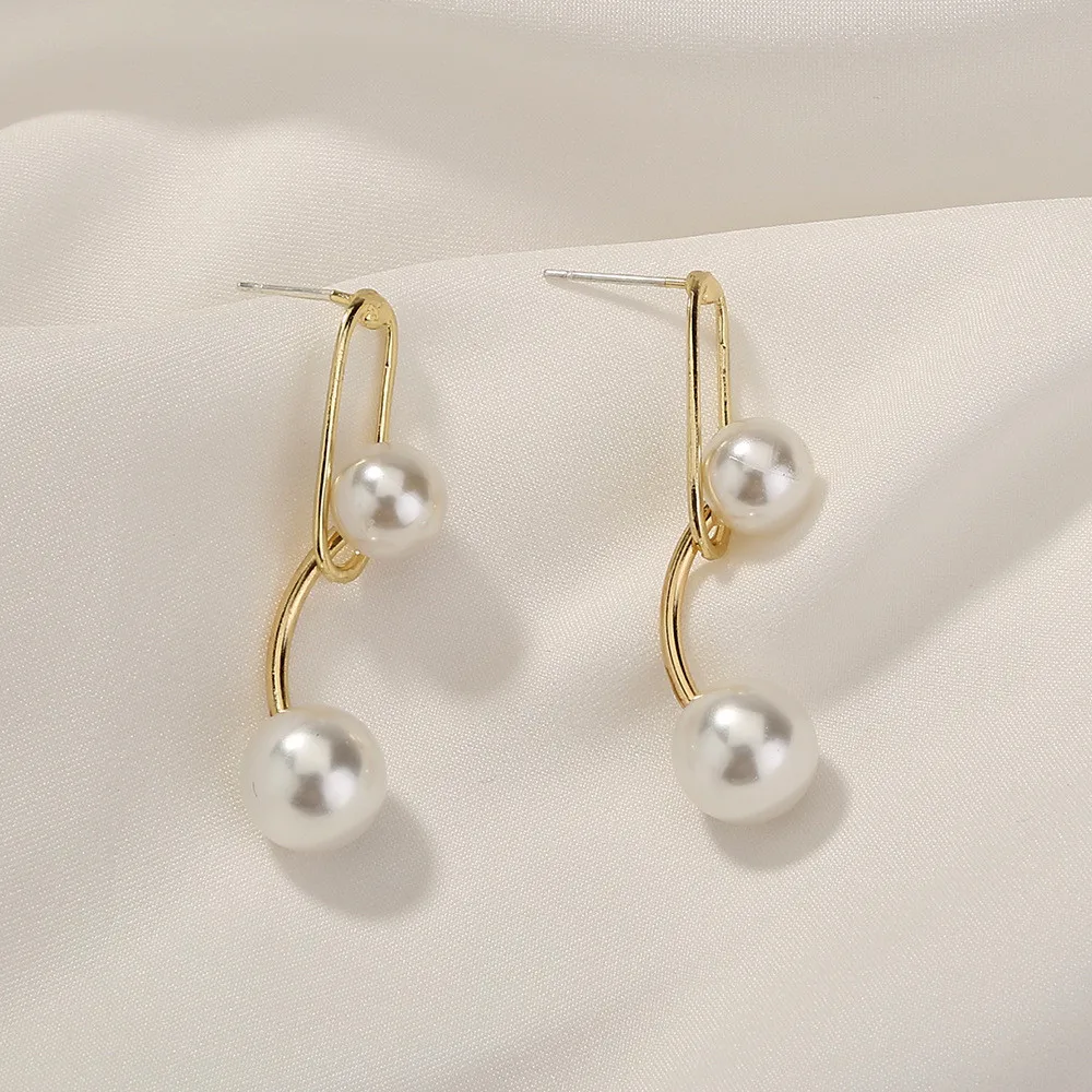 Minimalist Design Small Fresh Metal Hanging Drop Earrings Personality Pearl Pendant Dangle Earrings for Women 2021 New Jewelry
Minimalist Design Small Fresh Metal Hanging Drop Earrings Personality Pearl Pendant Dangle Earrings for Women 2021 New Jewelry