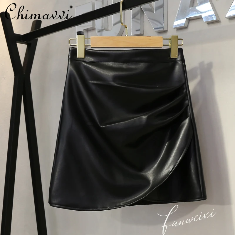 Women's Autumn High Waist Pleated PU Leather Skirt 2021 Fashion Irregular Slim A Line Skirt Lady Korean Ruched Short Hip Skirt
Women's Autumn High Waist Pleated PU Leather Skirt 2021 Fashion Irregular Slim A Line Skirt Lady Korean Ruched Short Hip Skirt