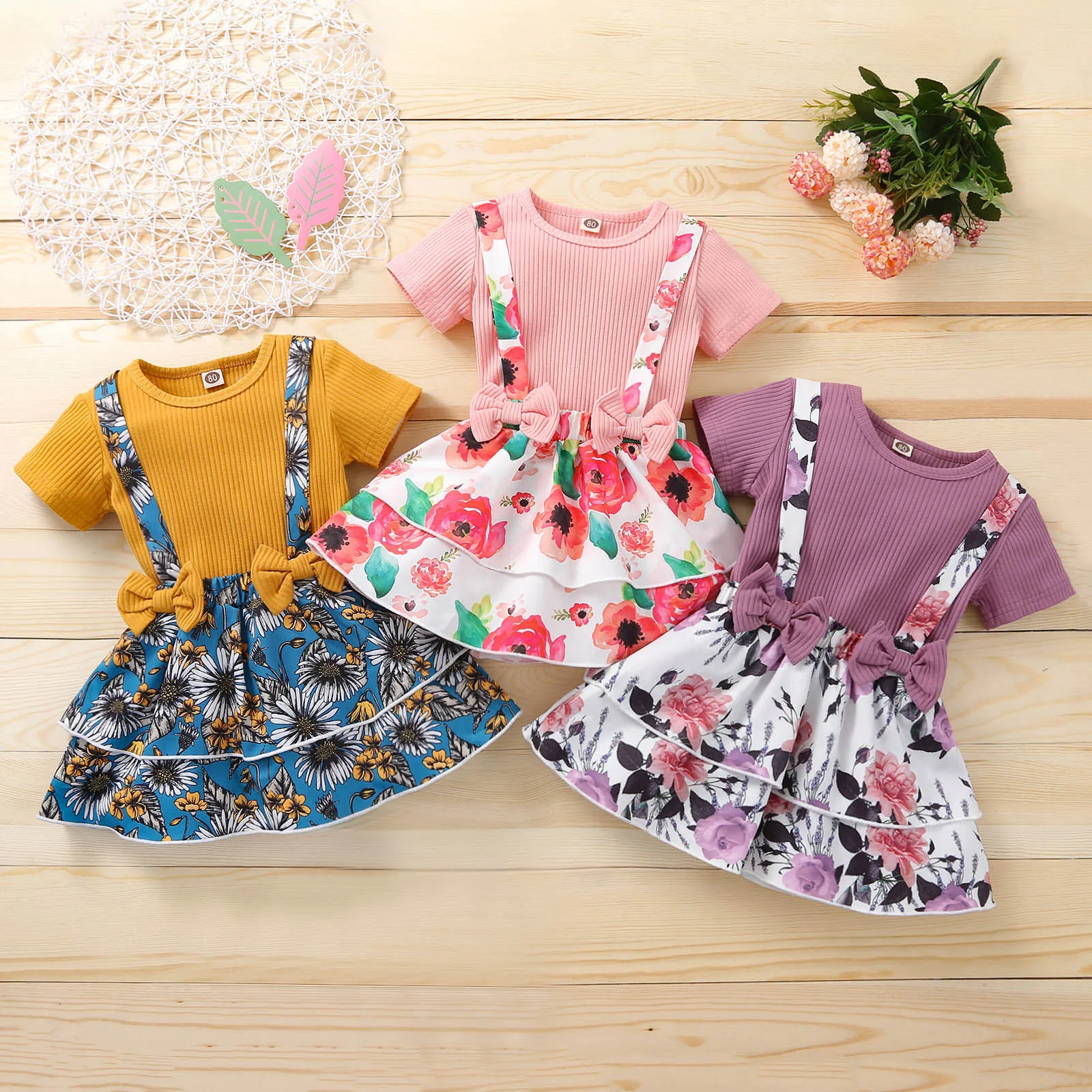 Citgeett Spring Toddler Baby Girls Skirts Outfits Short Sleeve Shirt Top + Suspender Floral Printed Skirt + Bowknot Headband Set 
Citgeett Spring Toddler Baby Girls Skirts Outfits Short Sleeve Shirt Top + Suspender Floral Printed Skirt + Bowknot Headband Set