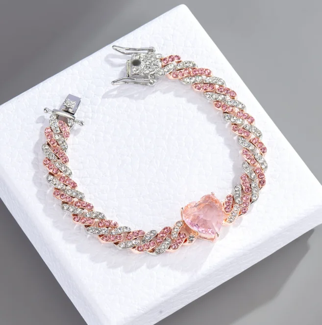 Popular two-color peach heart hip-hop Cuban chain alloy color Rhinestone fashion jewelry
Popular two-color peach heart hip-hop Cuban chain alloy color Rhinestone fashion jewelry