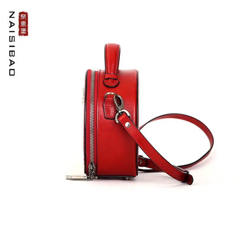 New Small round leather bag female head layer cowhide hand carry one shoulder messenger fashion wild trendy retro high-end
New Small round leather bag female head layer cowhide hand carry one shoulder messenger fashion wild trendy retro high-end