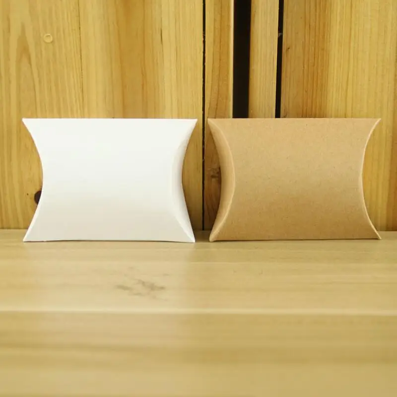 50pcs/lot Kraft Paper Pillow Shape Wedding Candy Box Gold Silver Ribbon Birthday Party Gift Box 9x6x2.5cm
50pcs/lot Kraft Paper Pillow Shape Wedding Candy Box Gold Silver Ribbon Birthday Party Gift Box 9x6x2.5cm