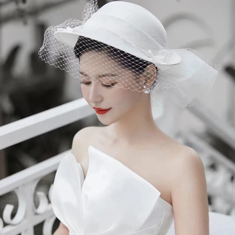 White Women Hat Wedding head piece for Bride Hard Tulle Bow with Veil украшение на голову Frence Chapeau Mariage Femme
White Women Hat Wedding head piece for Bride Hard Tulle Bow with Veil украшение на голову Frence Chapeau Mariage Femme